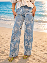 Cargar imagen en el visor de la galería, Pantalón denim con aplicaciones de flores

