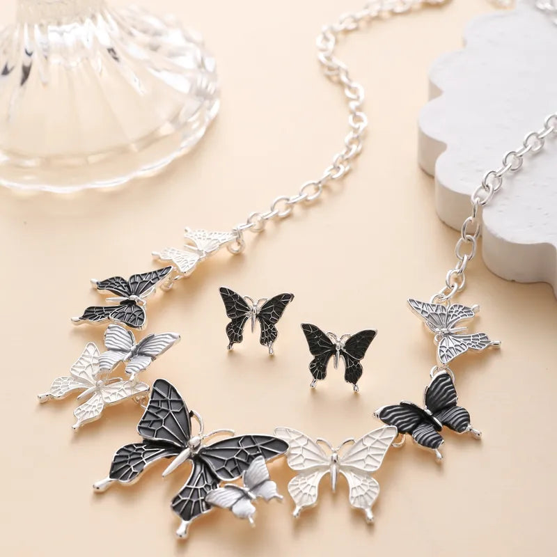 Collar mariposas con aretes