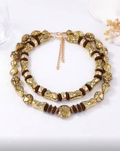 Cargar imagen en el visor de la galería, Collar doble dorado con negro

