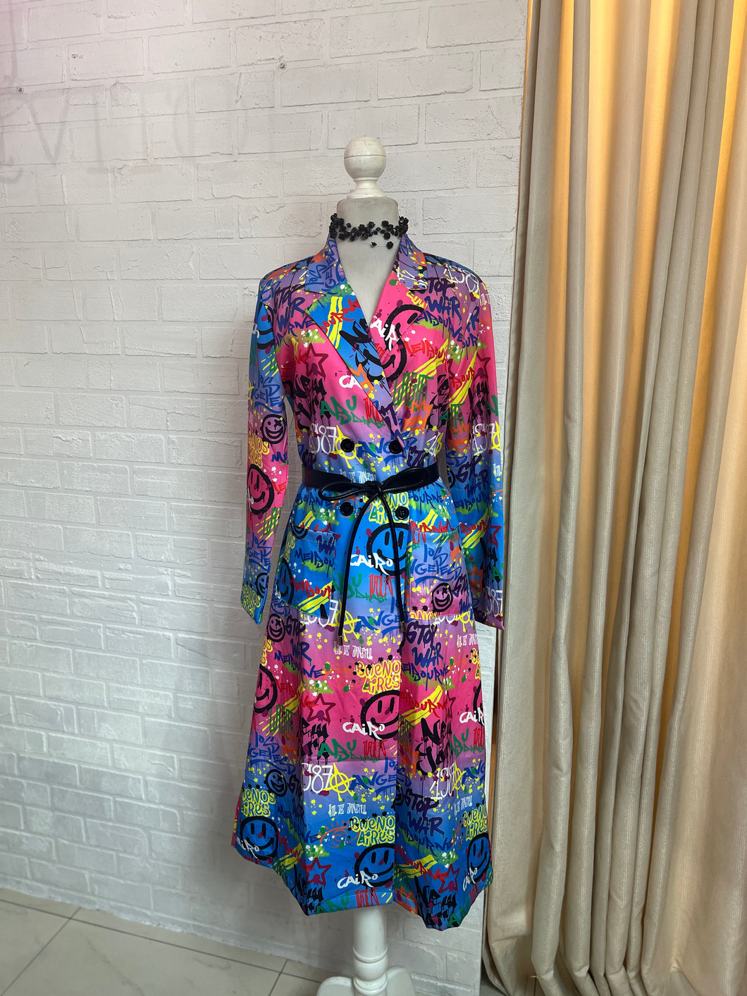 Gabardina estampado urbano