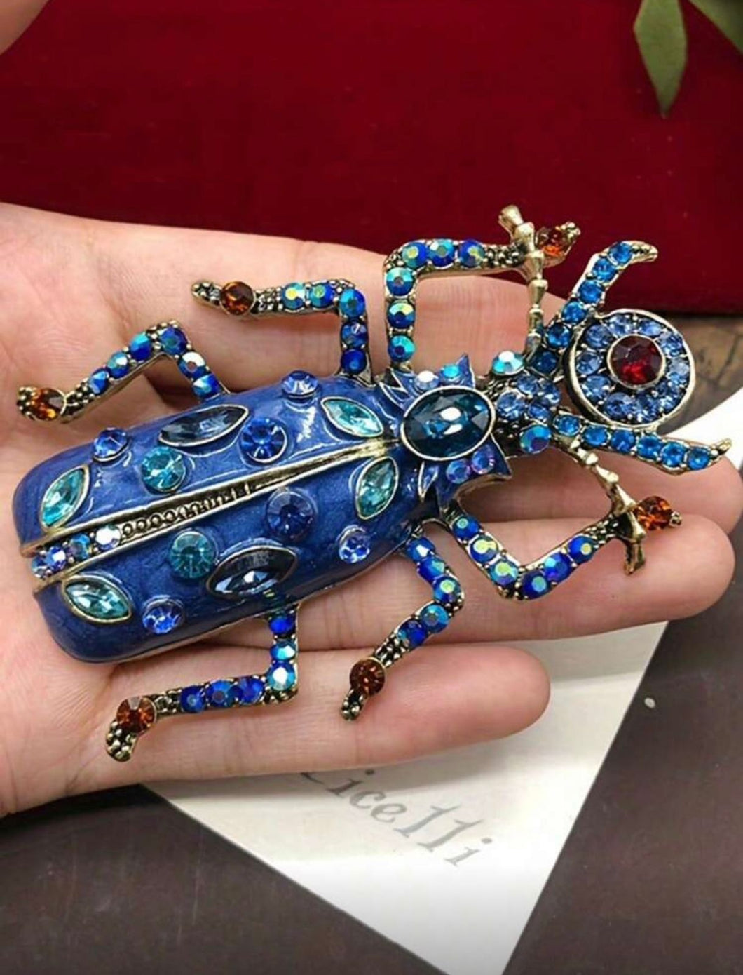 Prendedor escarabajo azul